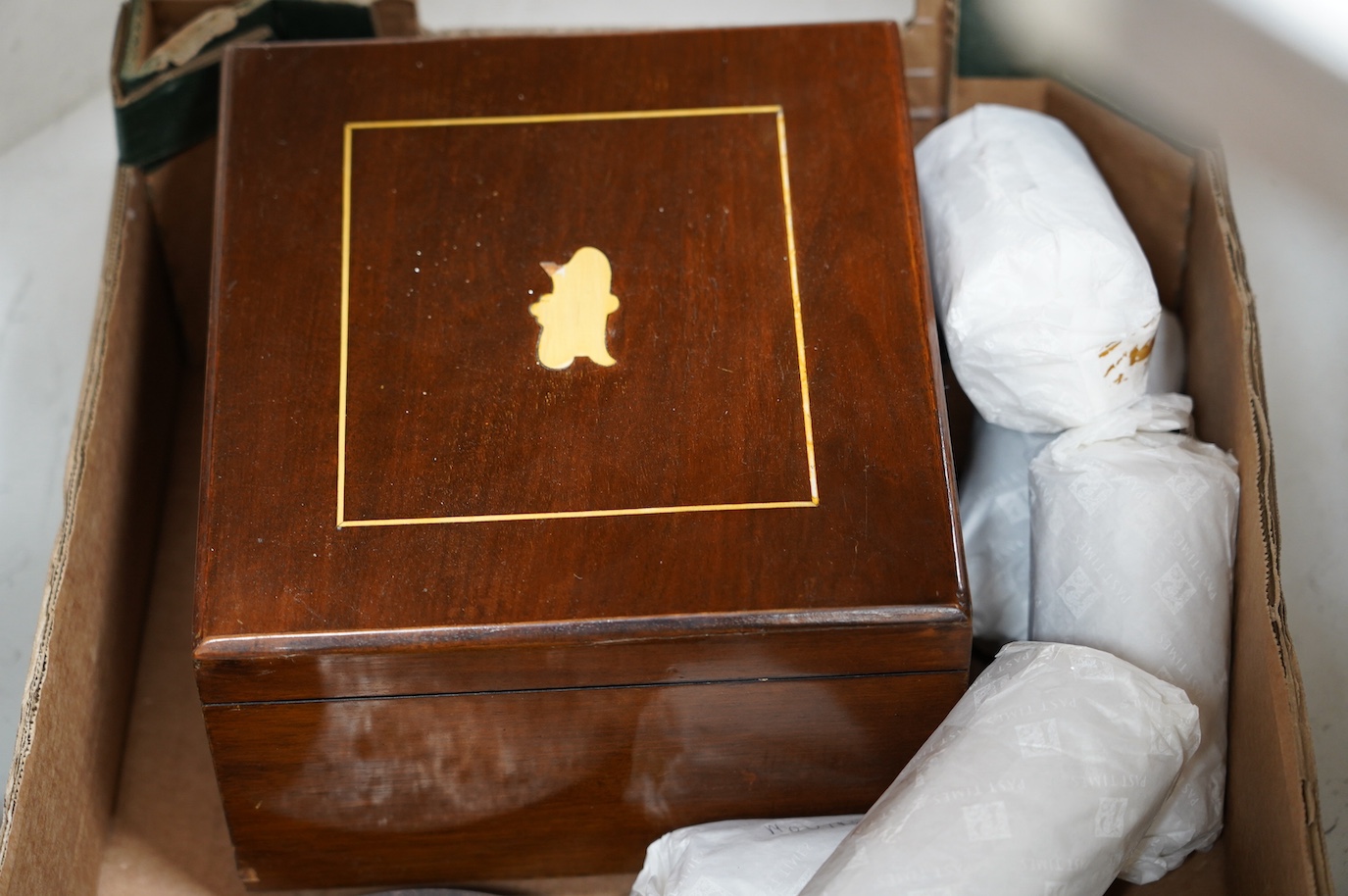 An oak cased Edison phonograph with ten rolls and a small table top polyphon with twelve 8 inch discs (2). Condition - fair to good.